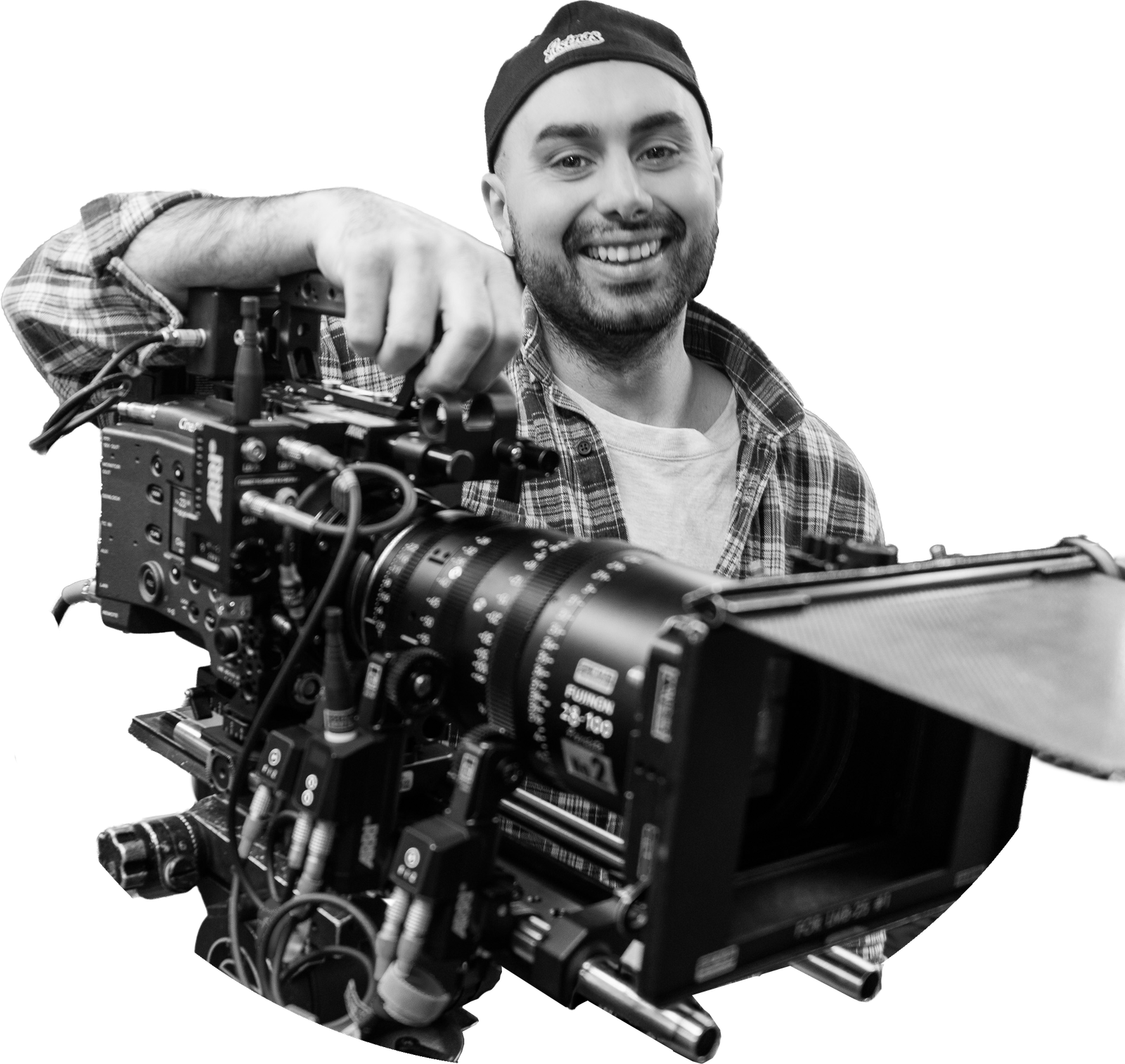 Sina Engin operating a cinema camera on set